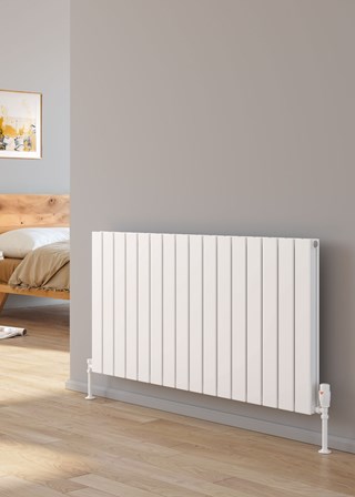 Reina Piatto finished in White - Size shown 600mm (H) x 1195mm Double - Shown with Reina Modal Thermostatic Radiator Valves, angled, White finish and White Pipe Sleeves and Shrouds
