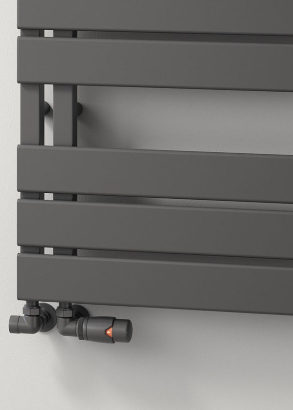 Reina Vada towel rail finished in Anthracite - Close-Up - Shown with Modal Thermostatic Radiator Valves, corner option finished in Anthracite Reina Vada towel rail finished in Anthracite - Close-Up - Shown with Modal Thermostatic Radiator Valves, corner option finished in Anthracite