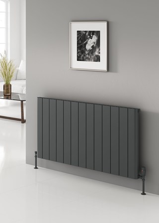 Reina Loco finished in Anthracite - Size shown 600mm (H) x 1230mm Single - Shown with Reina Modal Thermostatic Radiator Valves, angled, Anthracite finish and Anthracite Pipe Sleeves and Shrouds