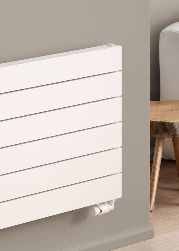 Reina Rienza finished in White - Close-Up - Shown with Modal Thermostatic Radiator Valves, corner option finished in White Reina Rienza finished in White - Close-Up - Shown with Modal Thermostatic Radiator Valves, corner option finished in White